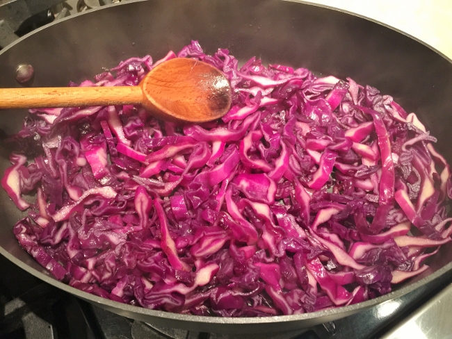 bratwursts-on-pretzel-buns-with-sauteed-mustard-red-cabbage-006-650x488