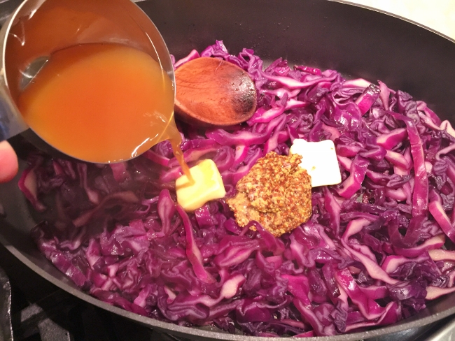 bratwursts-on-pretzel-buns-with-sauteed-mustard-red-cabbage-009-650x488